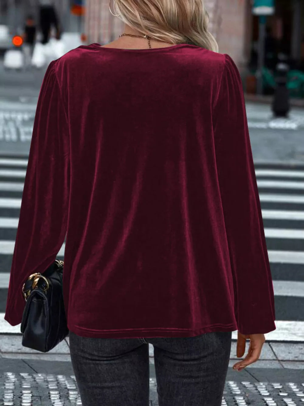 Burgundy velvet long sleeve blouse with cowl neck and puff sleeves.