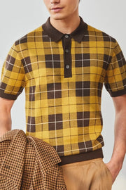 Checked knit polo shirt with contrast trim in plaid yellow and brown acrylic.