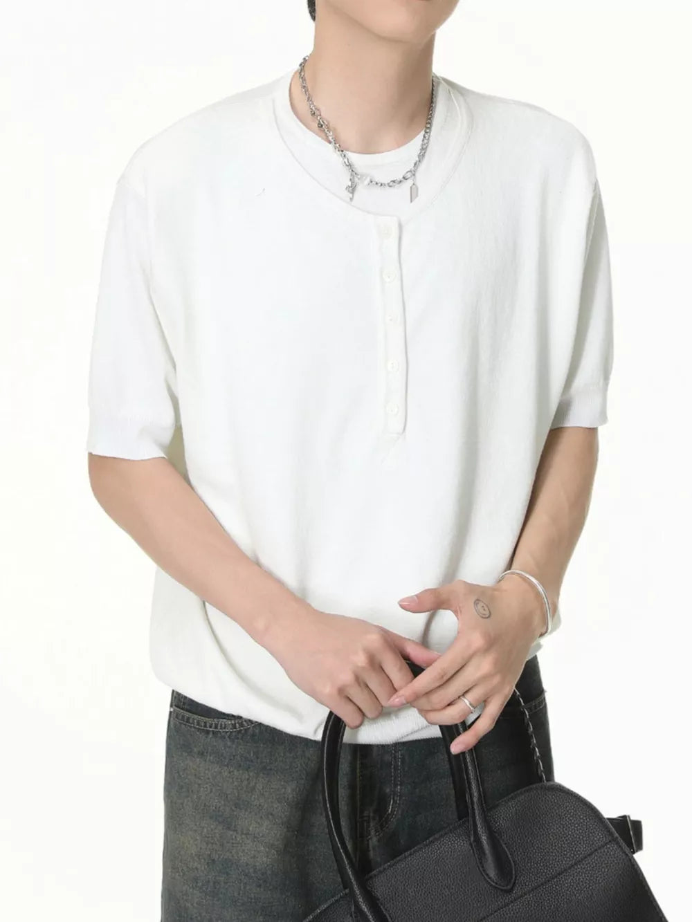 White short sleeve henley t-shirt with button placket and crew neck.