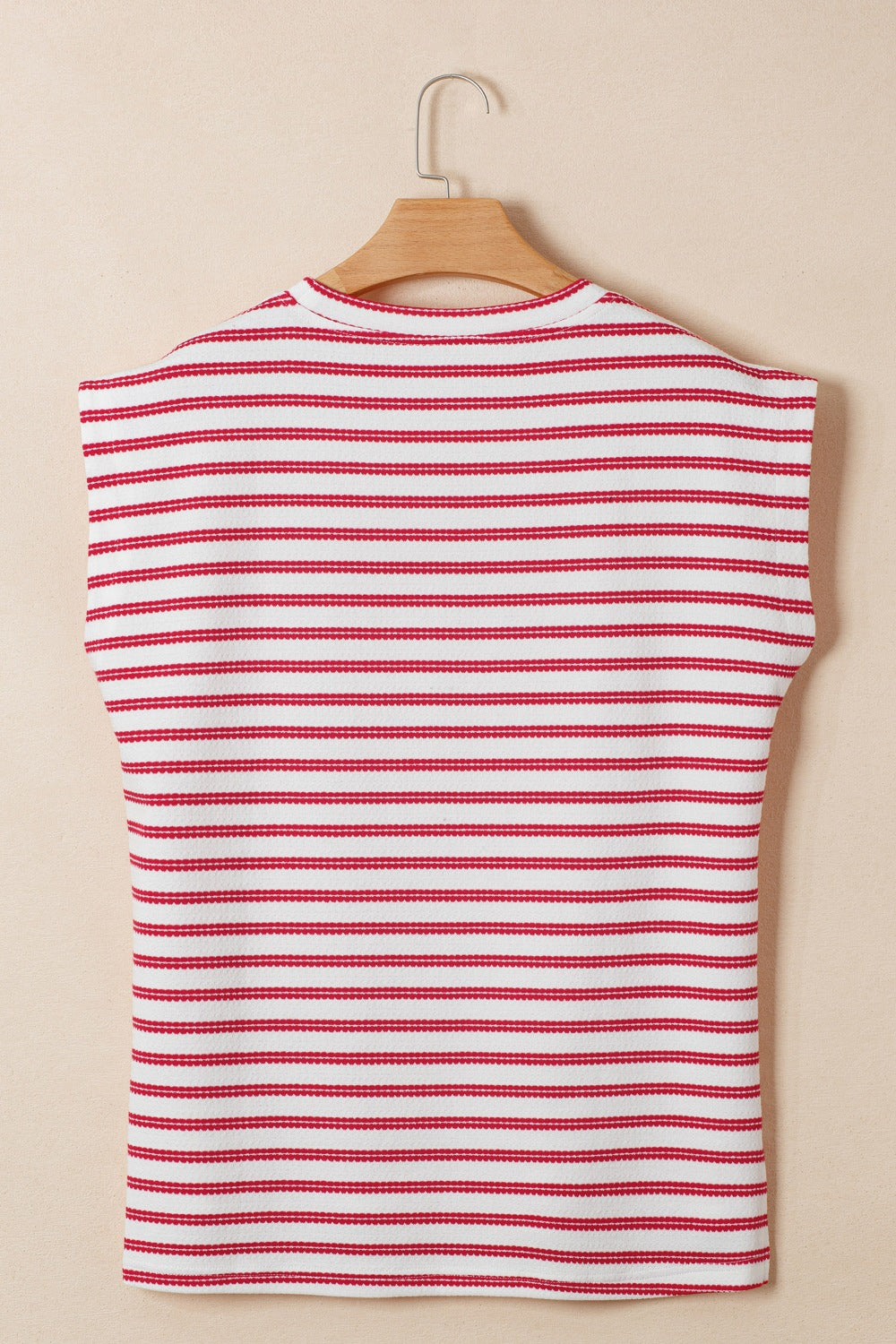 Textured knit tee with red and white stripes, crew neck, and decorative button detail.