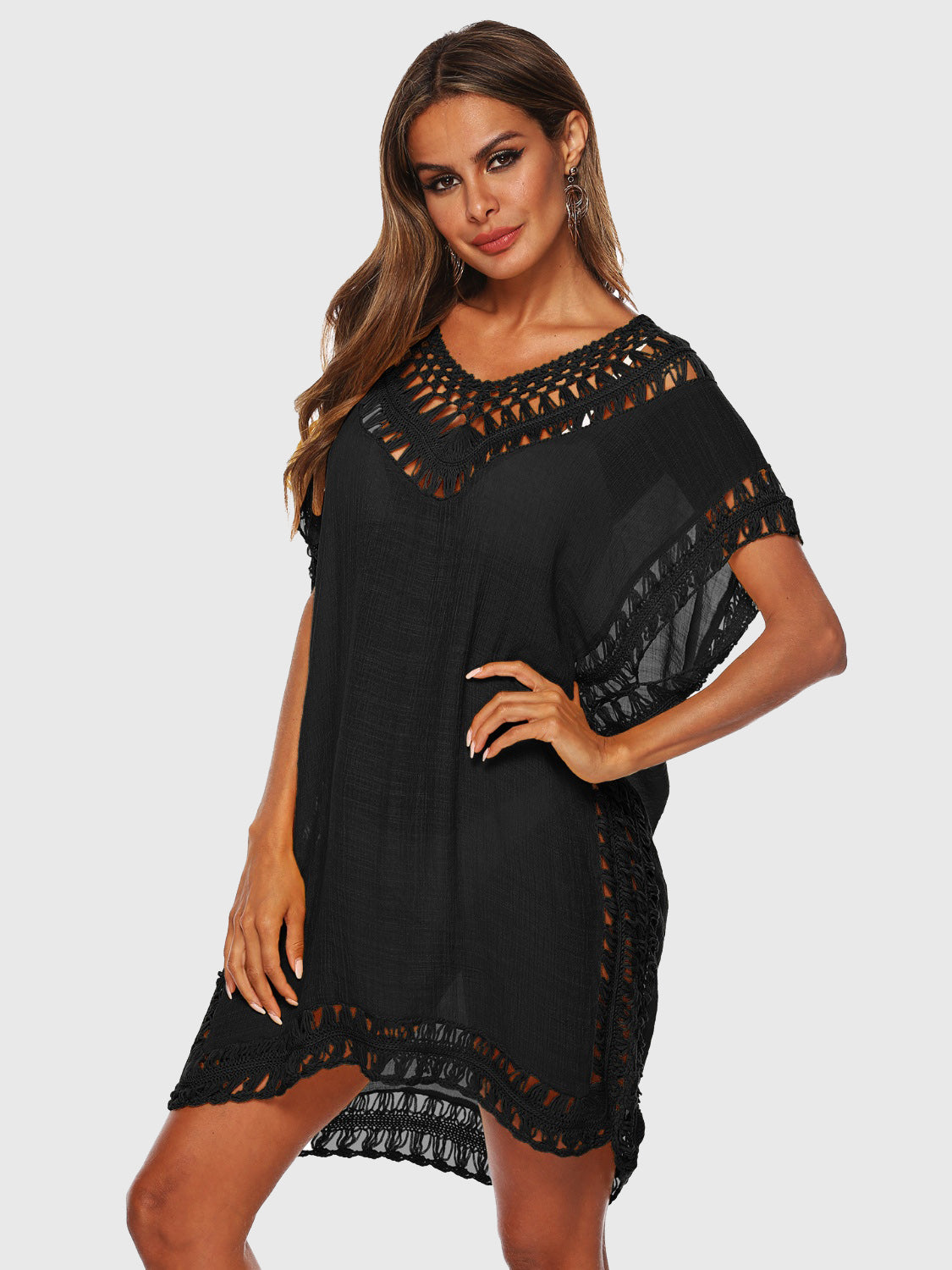 Black crochet trimmed kaftan cover-up with V-neck and short sleeves.