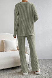 Ribbed knit lounge set in Sage, featuring a crew neck top and flared pants.