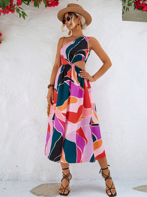 Abstract cutout midi dress with one-shoulder design and colorful geometric print