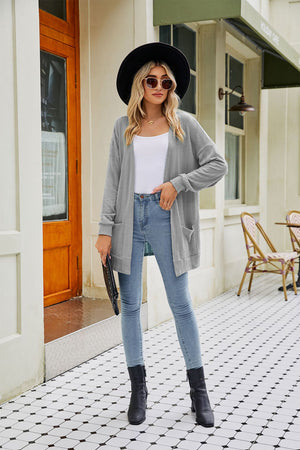 Chic grey open front cardigan with pockets and chevron knit pattern.