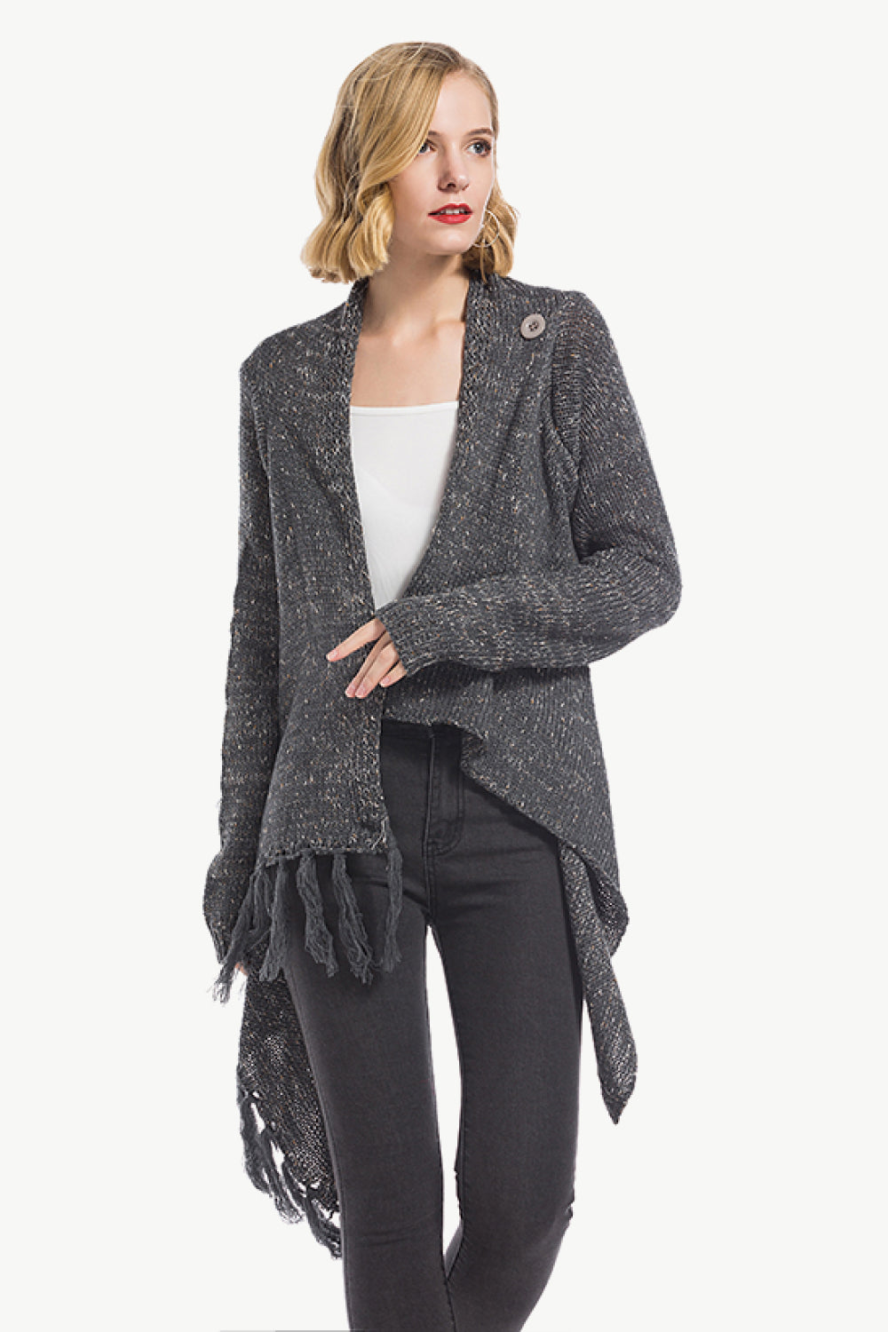 Asymmetric fringe knit cardigan in dark gray with a button closure and waterfall hem.
