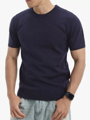 Men's royal blue knit crew neck undershirt with short sleeves and ribbed hem.