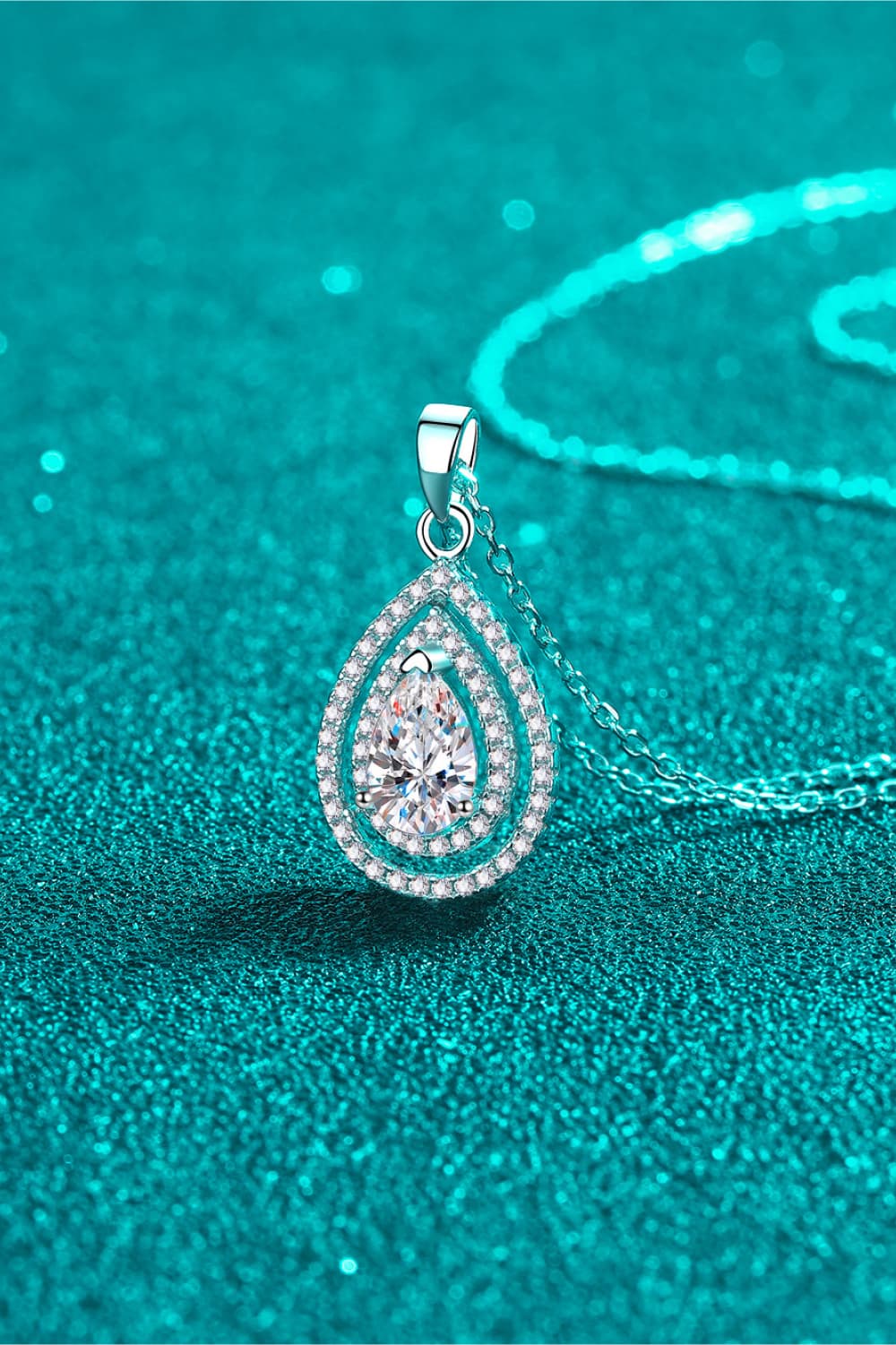 Silver double halo moissanite teardrop necklace with 925 sterling silver chain.