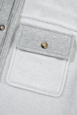 Light Gray cotton utility vest with contrast trim and button-down chest pocket.