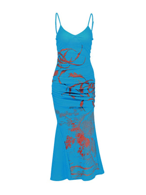 Blue spaghetti strap maxi dress with botanical print and ruched sides