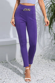 Chain detail high-waisted skinny trousers in electric purple with a gold chain belt detail.