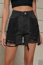 Black denim shorts with distressed rips and fringe pocket details.