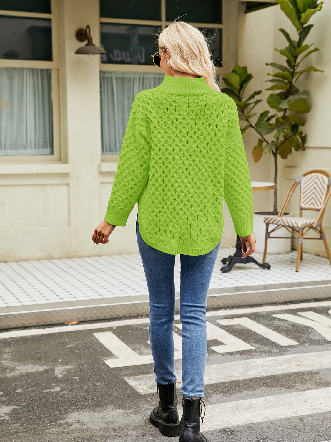 Lime textured diamond knit turtleneck sweater with a relaxed fit and curved hem.