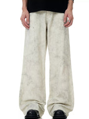 Men's wide-leg pants in marble wheat with a stone-washed pattern and relaxed fit.