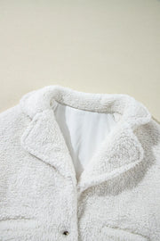 White teddy bear collarless jacket with a clasp closure and lapel collar.