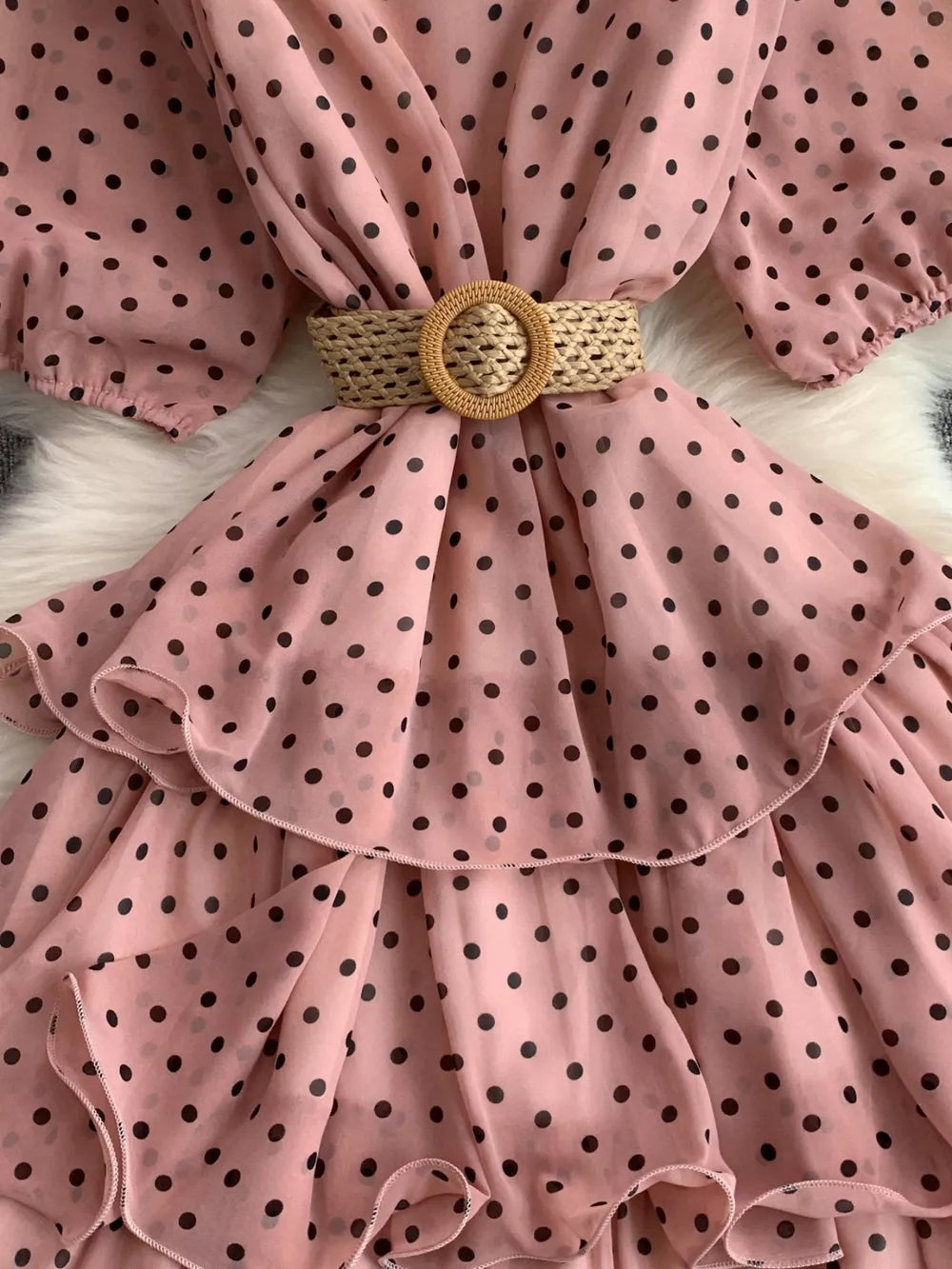 Pink polka dot tiered chiffon dress with woven belt detail