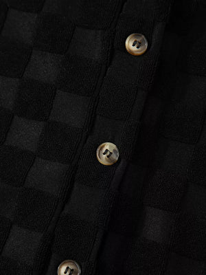 Black checkered wide-leg jumpsuit with button-front detail