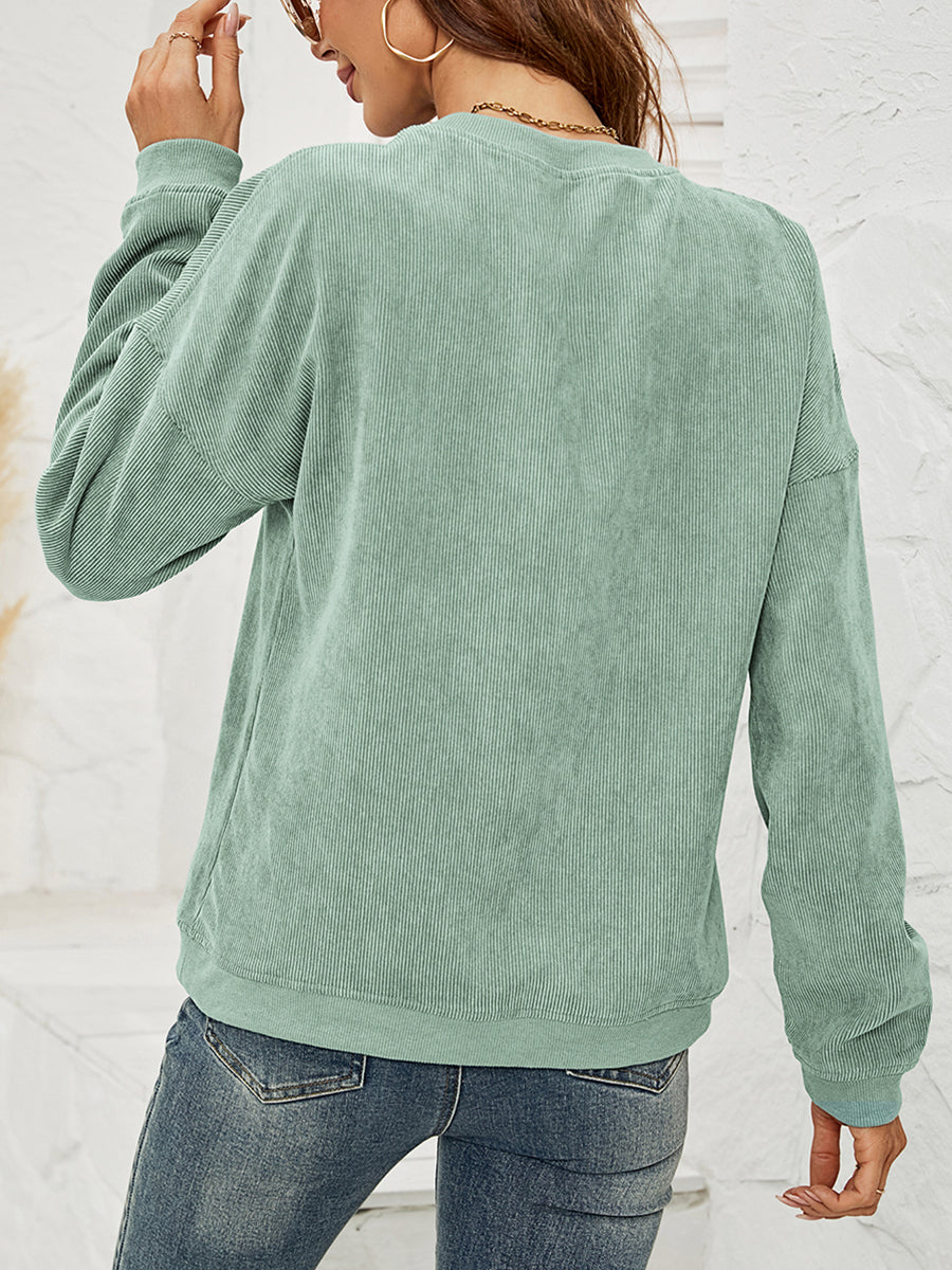 Corduroy sweatshirt in Gum Leaf green with long sleeves and crew neck.