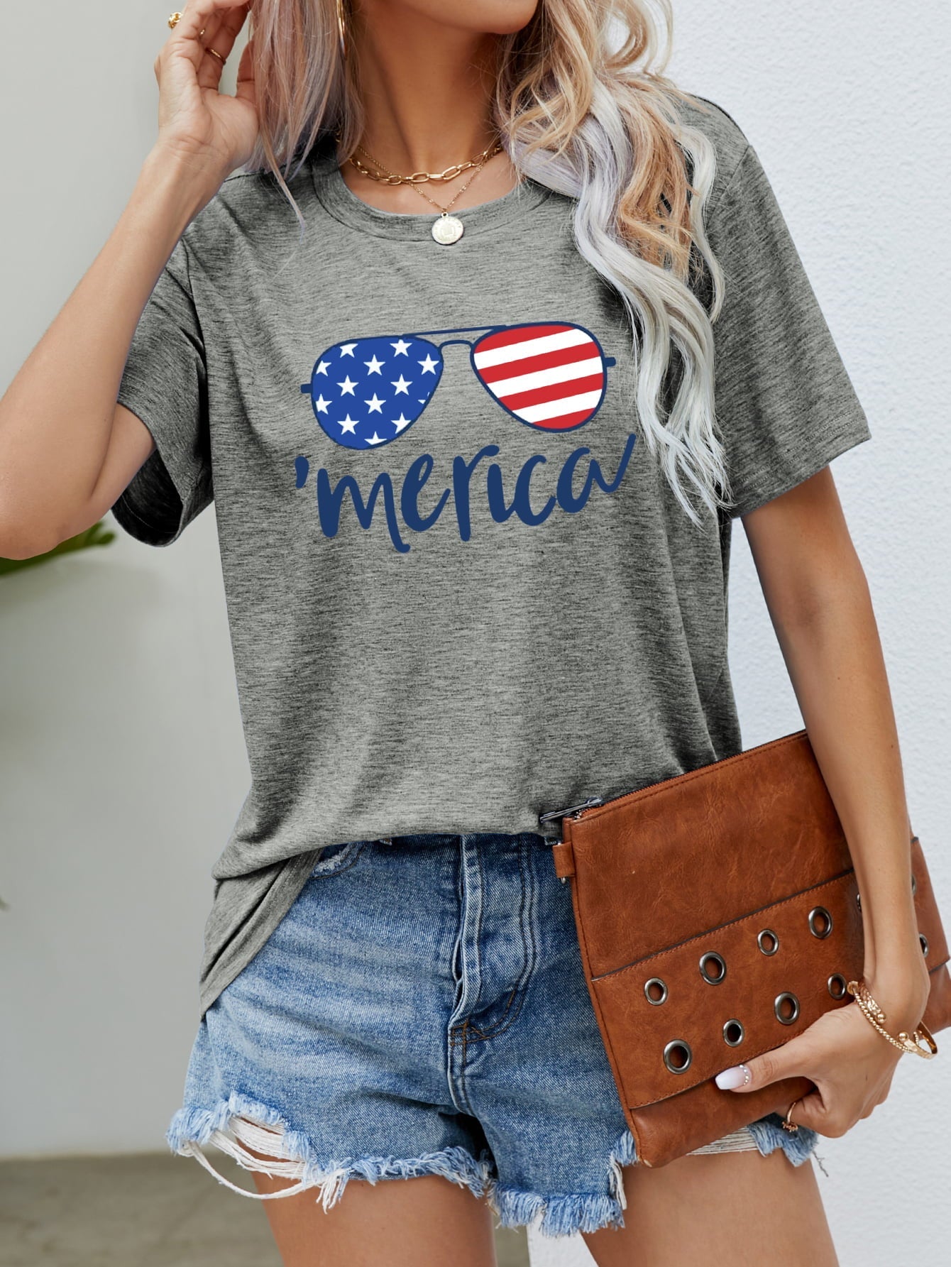 Gray crew neck t-shirt with 'Merica script and American flag sunglasses graphic.