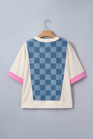 Maternity t-shirt with blue checkered denim panel, cream waffle knit, and pink sleeve trim.