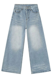 Baggy light blue denim palazzo jeans with a faded wash and wide leg.