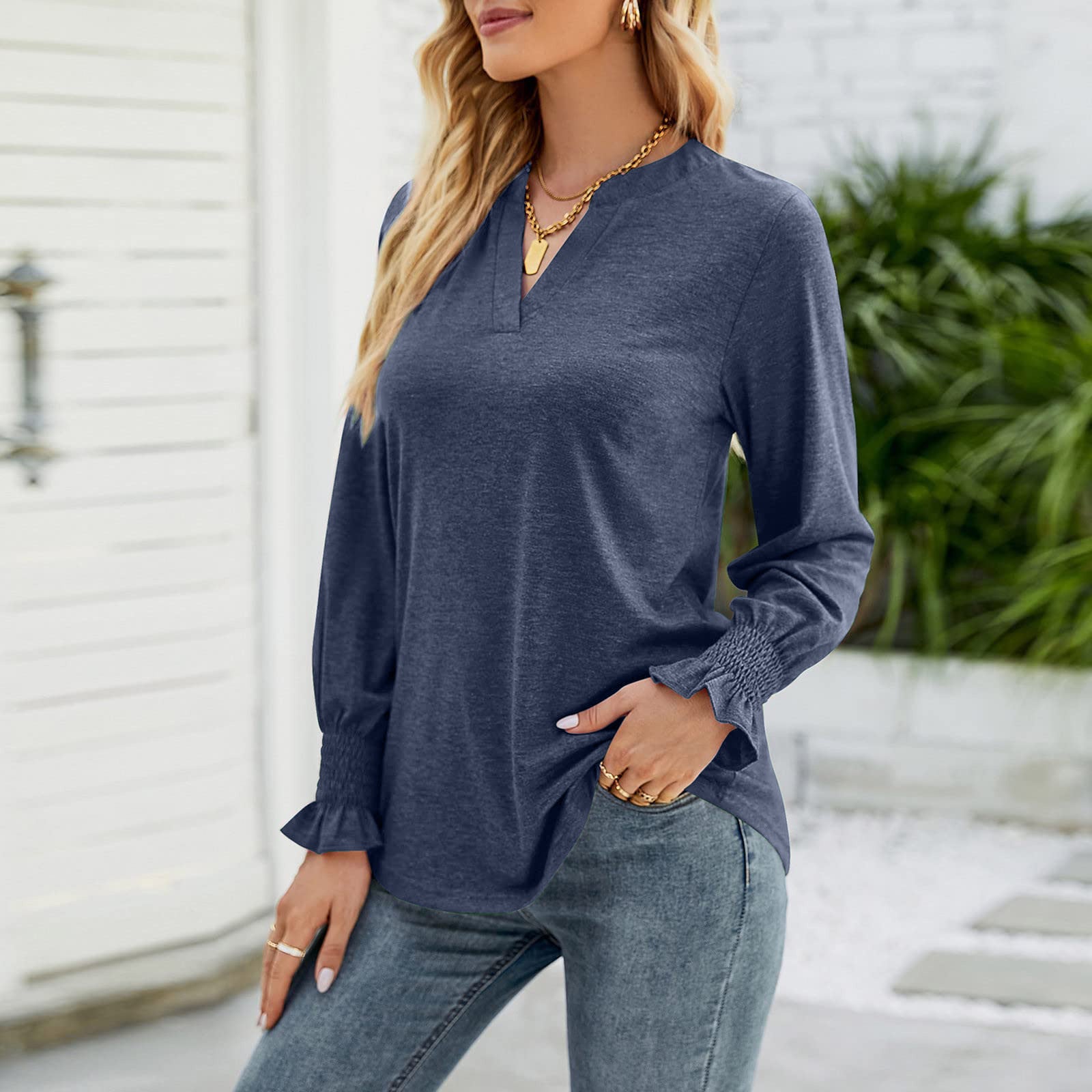Indigo V-neck jersey top with gathered cuff long sleeves.