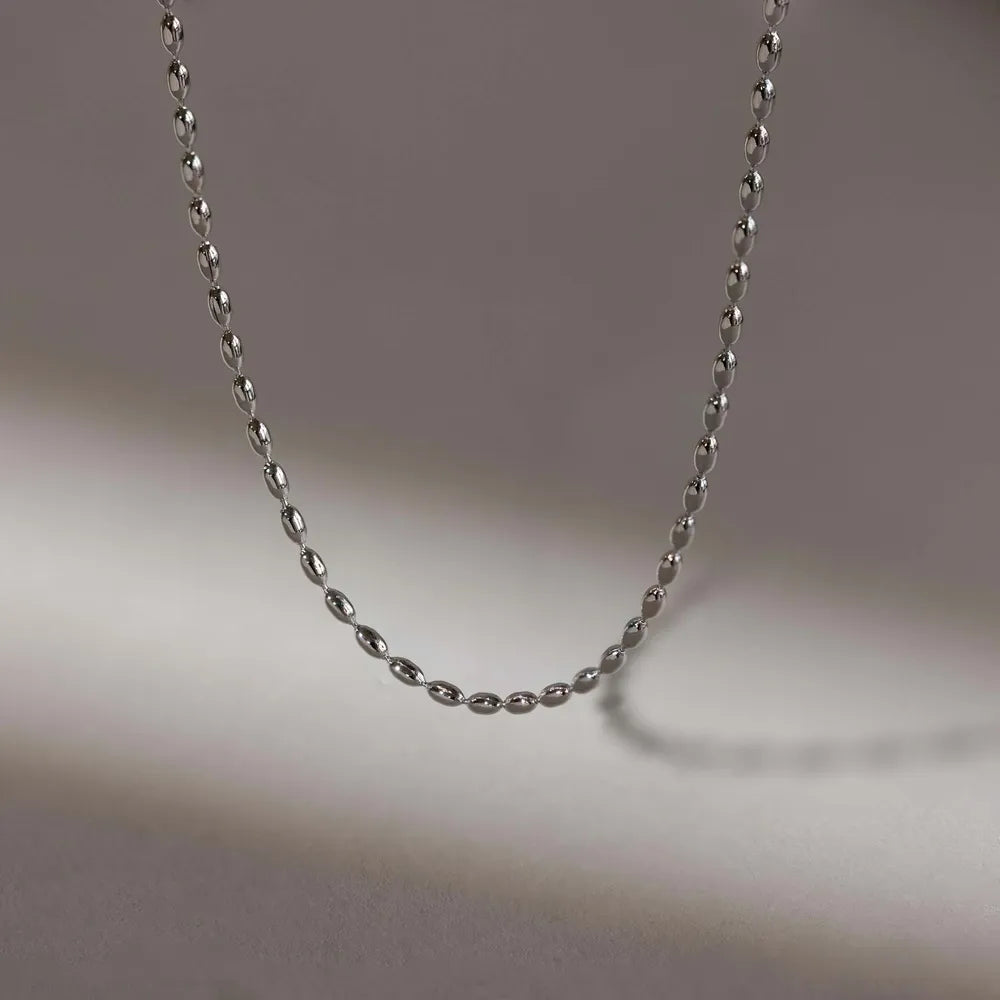 Silver capsule chain necklace with oval beads