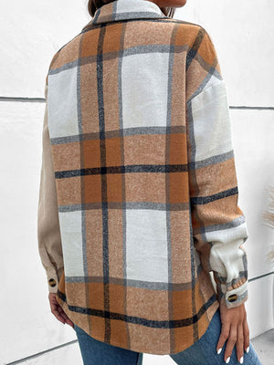 Colorblock plaid shacket with corduroy sleeves and button cuffs.