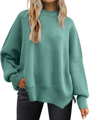Teal ribbed-knit relaxed fit sweater with mock neck and balloon sleeves.