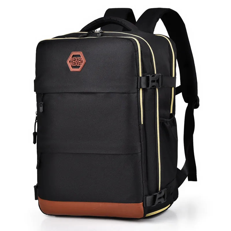 Black travel backpack with contrast tan bottom panel and yellow trim details.
