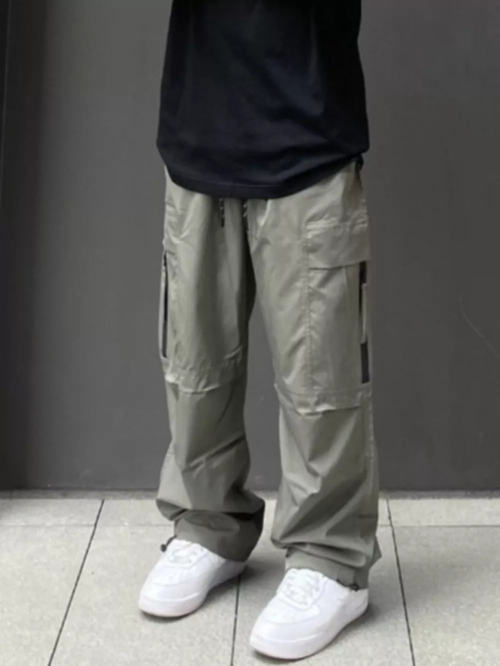 Men's Gray Green relaxed fit cargo sweatpants with ankle drawstring and multiple pockets.