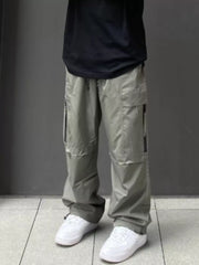 Men's Gray Green relaxed fit cargo sweatpants with ankle drawstring and multiple pockets.