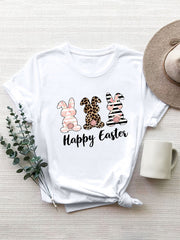 White t-shirt with three graphic bunnies and Happy Easter text.