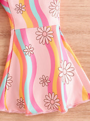 Baby jumpsuit with pink, yellow, blue, and orange wavy stripes and floral print.