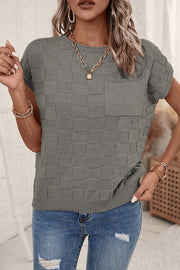 Dark gray knit pocket tee with square texture, crew neck, and short sleeves.