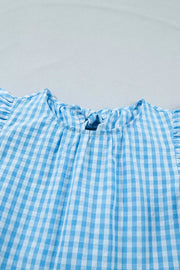 Blue gingham tiered maxi dress with ruffled sleeves and knot back detail