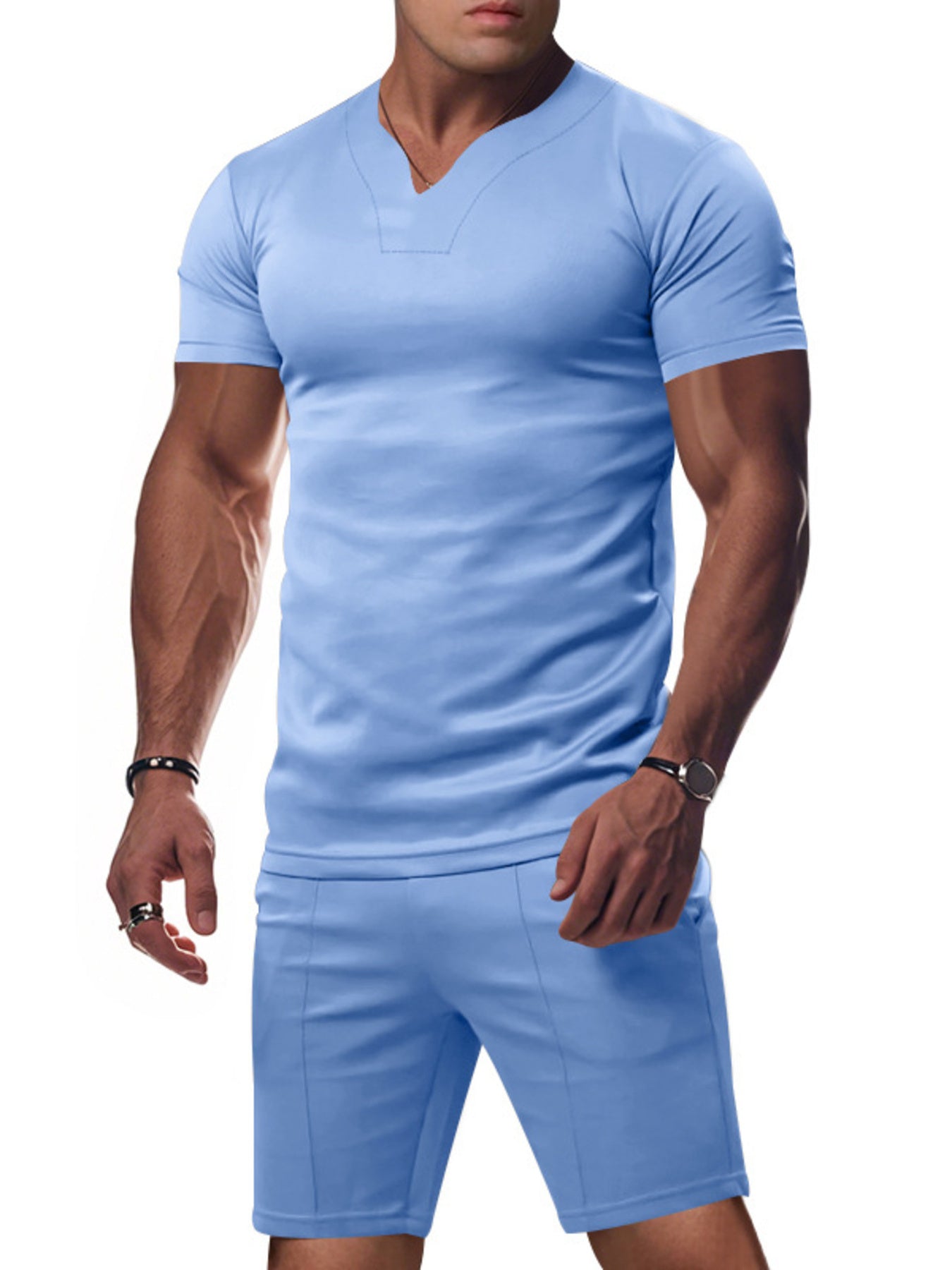 Light blue v-neck tee with notched collar and matching shorts set for men.