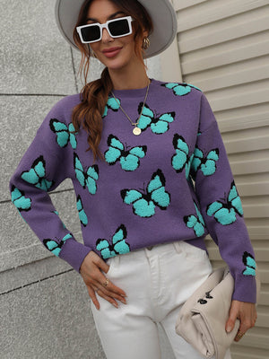 Purple knit crewneck sweater with allover turquoise butterfly motif.