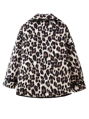 Leopard quilted kimono jacket with black trim and collar.