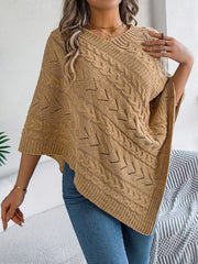Camel cable knit poncho with chevron detail and V-neck.