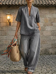 Gray cotton V-neck top and wide-leg pants set with cuffed ankles and curved hem