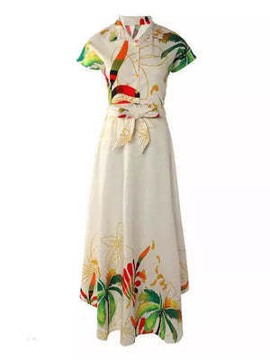 Tropical print crop top and skirt set with button front and tie waist.