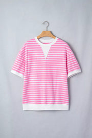 Pink and white striped cotton t-shirt with round neck and short sleeves.
