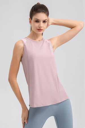 Dusty Pink mesh panel performance tank top with round neckline and raglan sleeves.