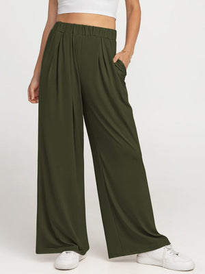 Army green pleated palazzo trousers with pockets and elastic waistband.