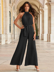 Black halter neck pleated palazzo jumpsuit with belted waist.