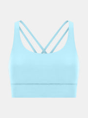 Pastel blue sports bra with crisscross back straps and a scoop neckline.