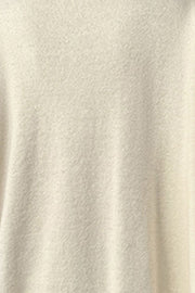 Light Yellow V-neck knit sweater with asymmetric hemline detail