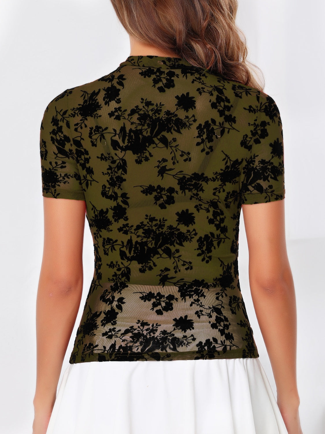 Moss velvet floral mesh mock neck top with short sleeves.