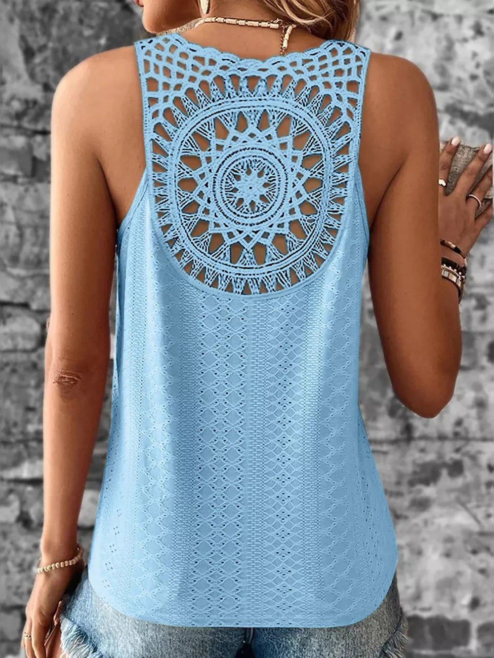 Sky blue eyelet lace tank top with intricate crochet back detail.
