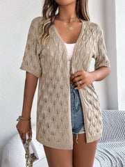 Tan open-knit short sleeve cardigan with leaf motif and V-neck.